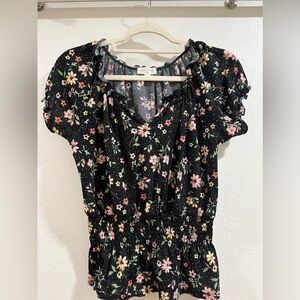 Black floral top with V-neck
